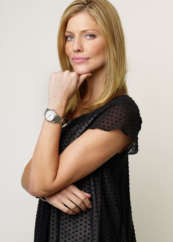 woman in black dress posing