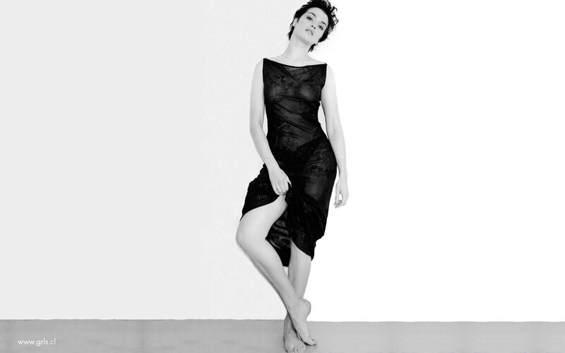 woman in black dress posing
