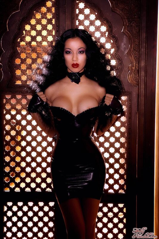 woman in black dress posing