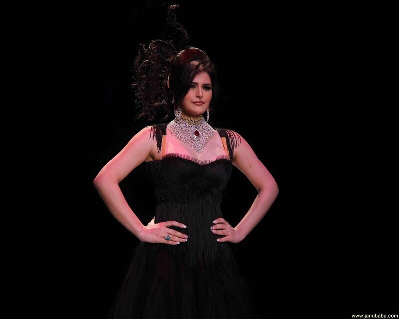 woman in black dress posing
