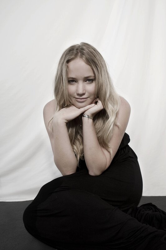 woman in black dress posing