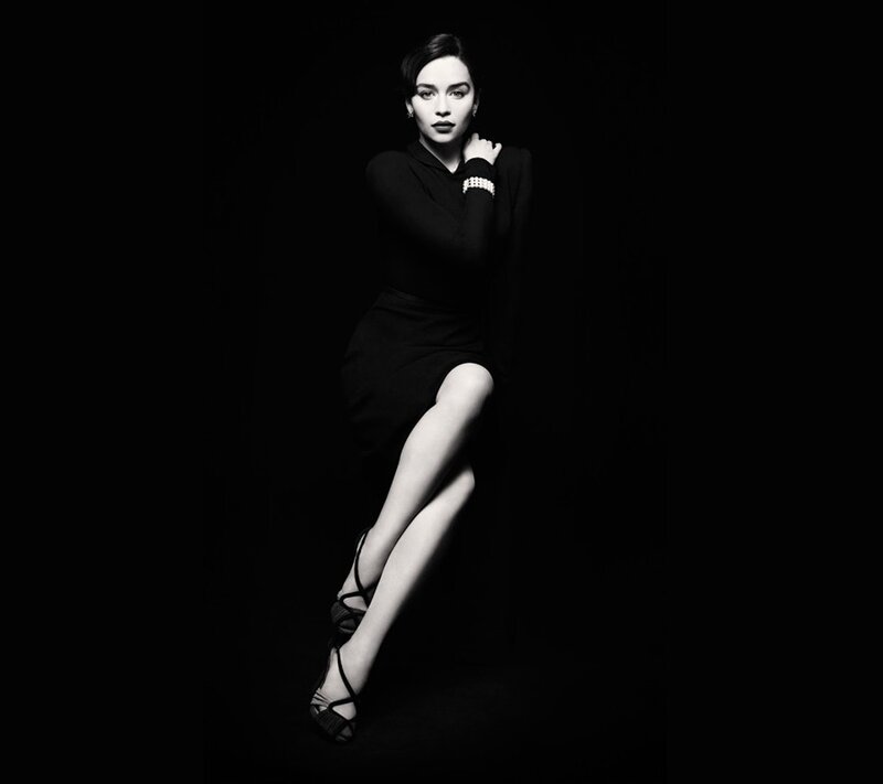 woman in black dress posing