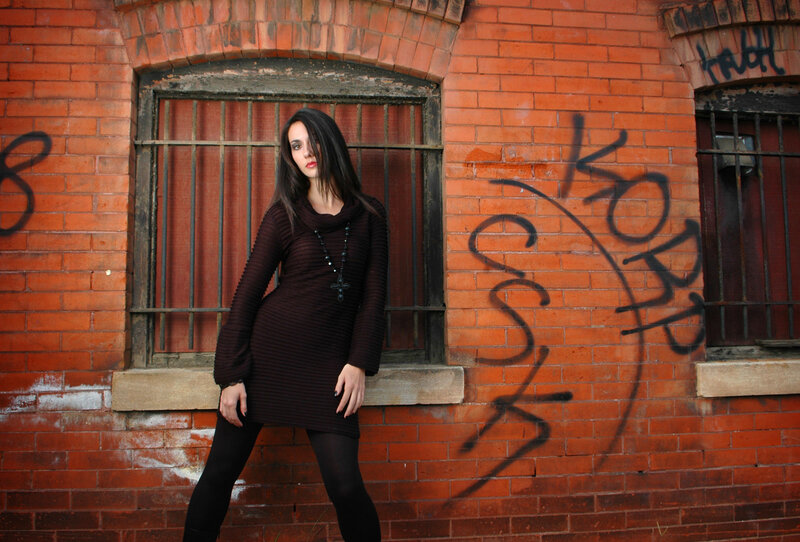 Woman in Black Dress — Red, Dramatic, Photograph, Brick Wall