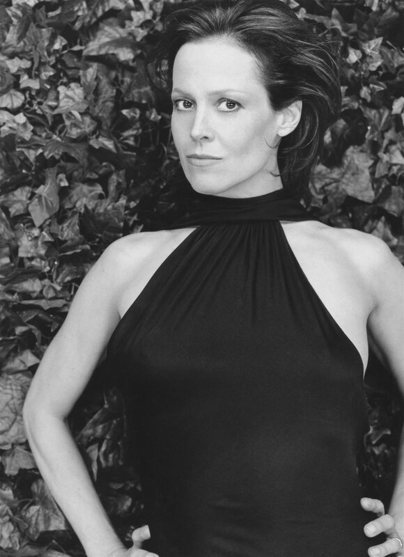 Woman in Black Dress — Serious, Photograph, Leaves