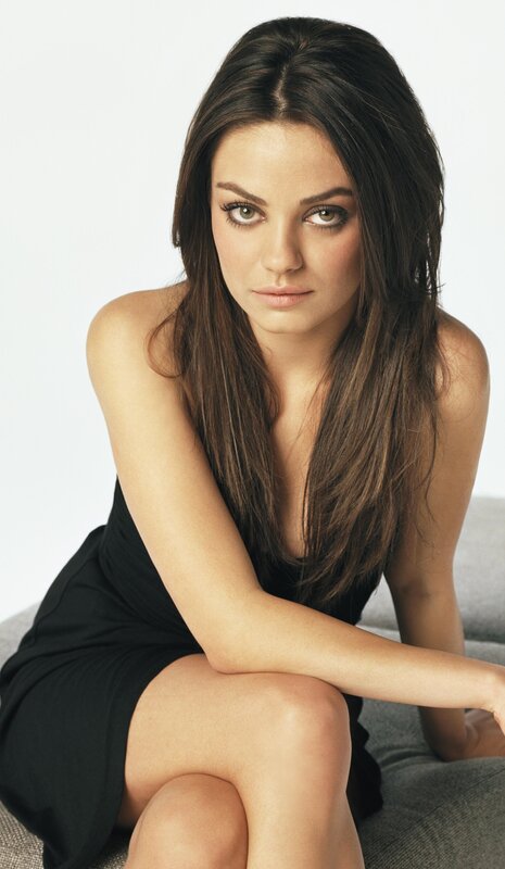 woman in black dress sitting