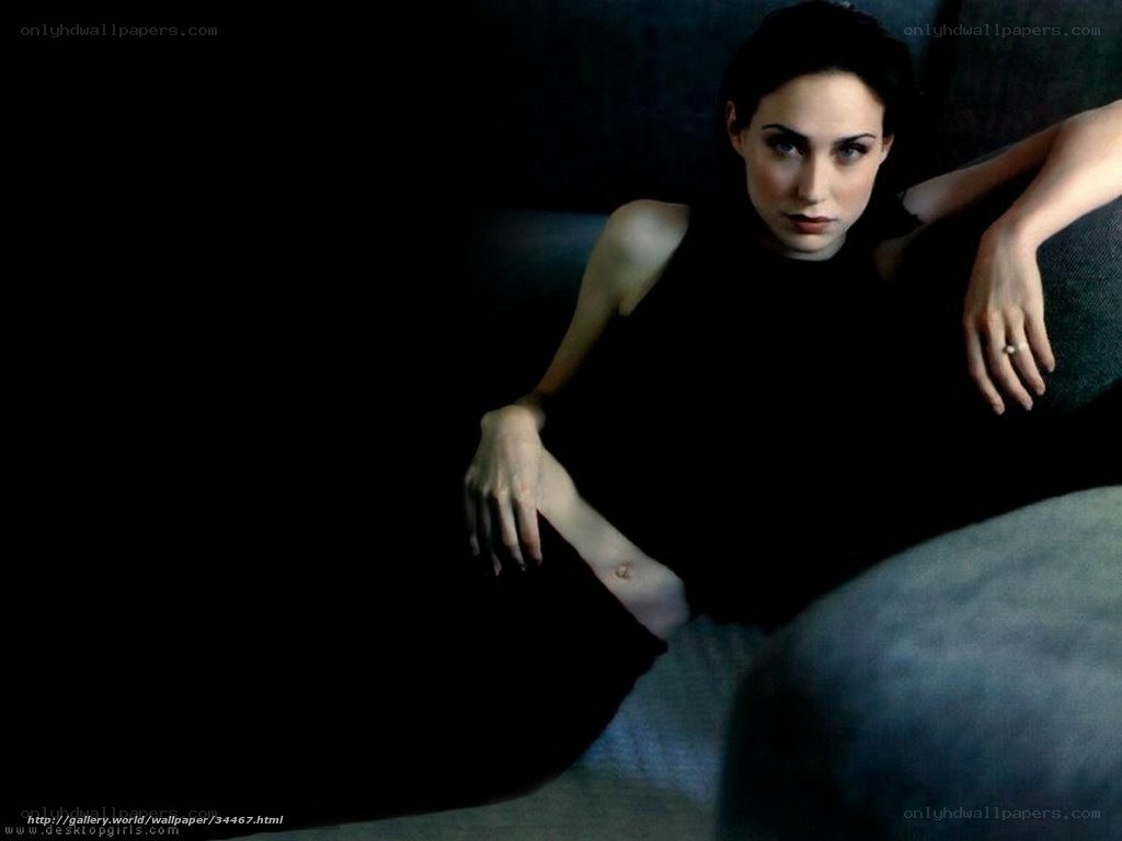 woman in black dress sitting