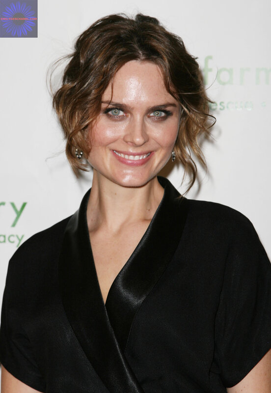 woman in black dress smiling