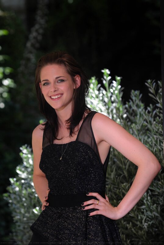 Woman in Black Dress — Smiling, Night, Photograph, Plants
