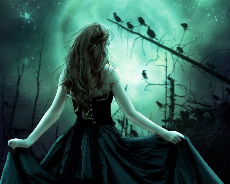 woman in black dress under moonlight
