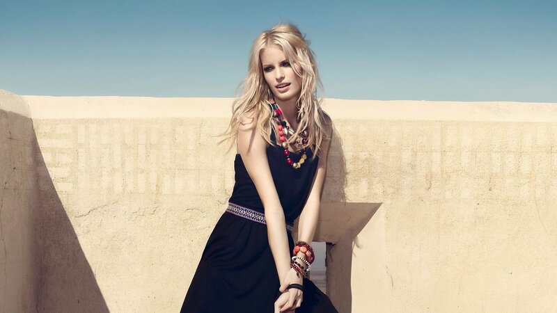 woman in black dress with beads