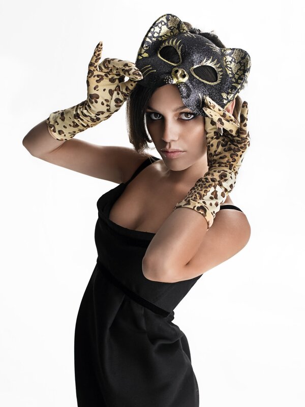 woman in black dress with cat mask