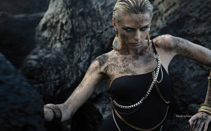 woman in black dress with chains
