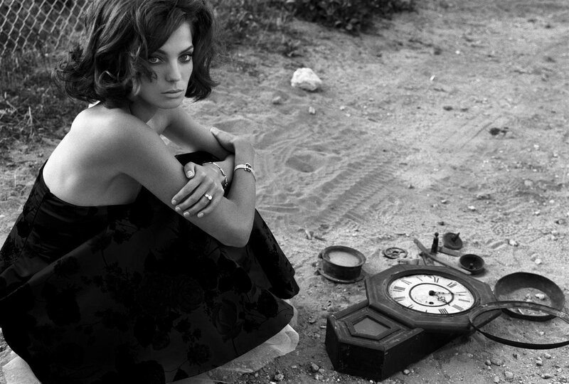 woman in black dress with clock