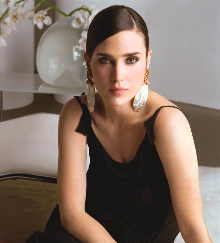 woman in black dress with earrings