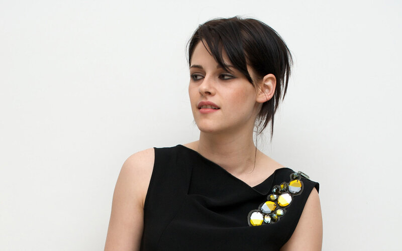woman in black dress with embellishments