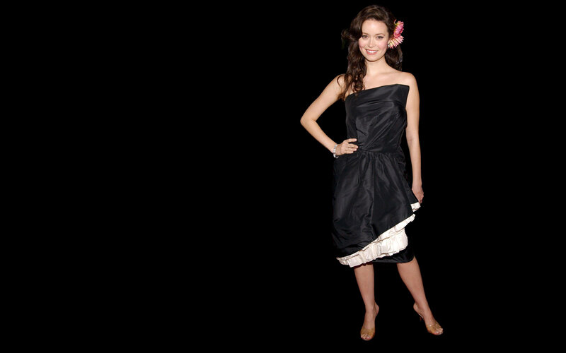 woman in black dress with flower