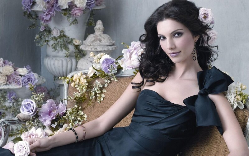 woman in black dress with flowers