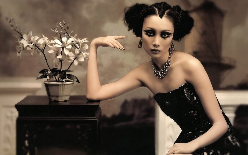 woman in black dress with flowers