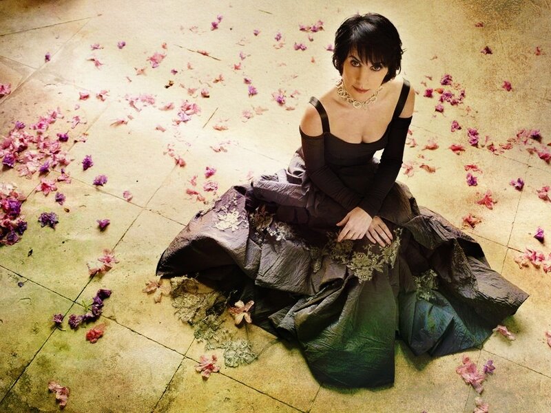 woman in black dress with flowers