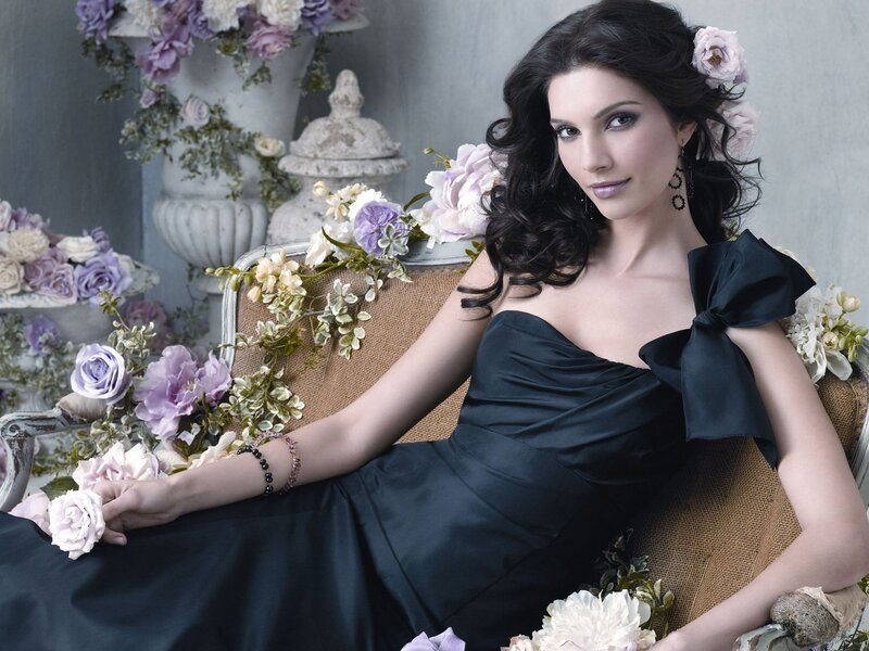 woman in black dress with flowers