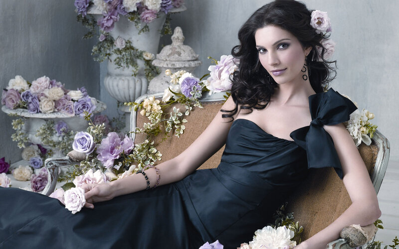 woman in black dress with flowers