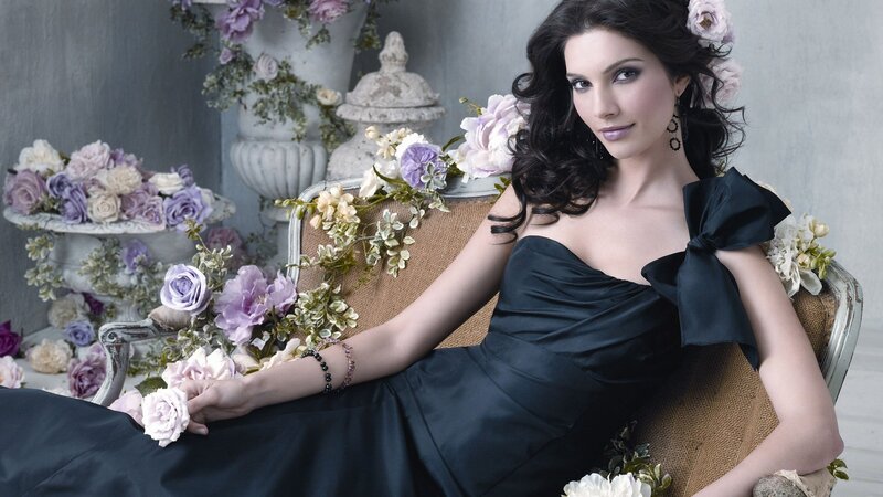 woman in black dress with flowers