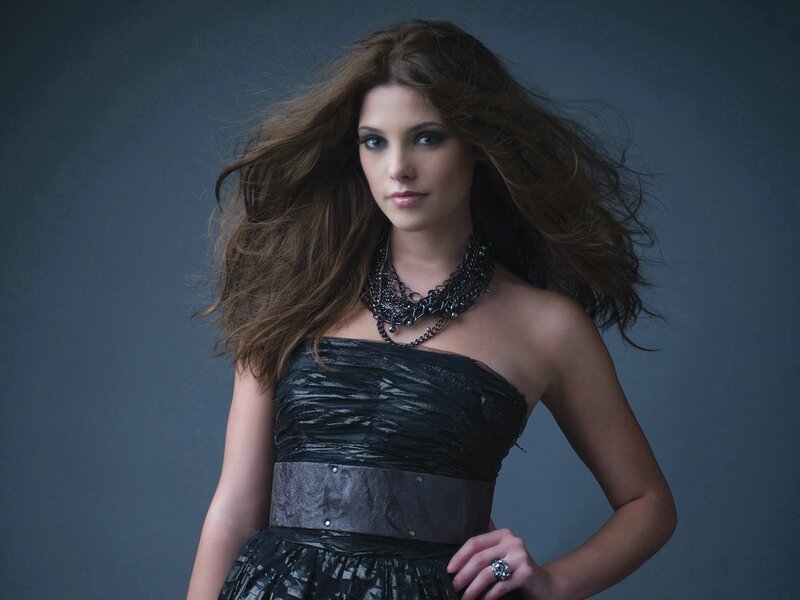woman in black dress with flowing hair