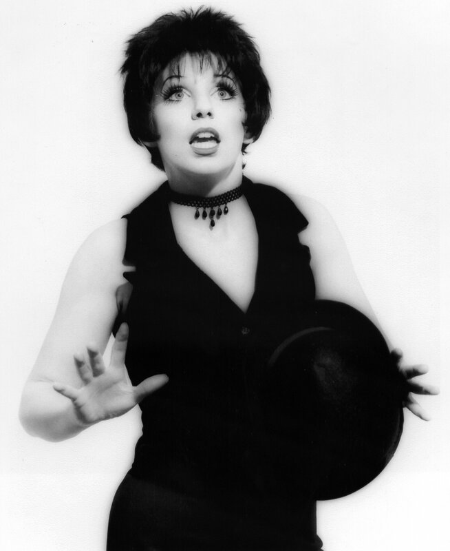 woman in black dress with hat