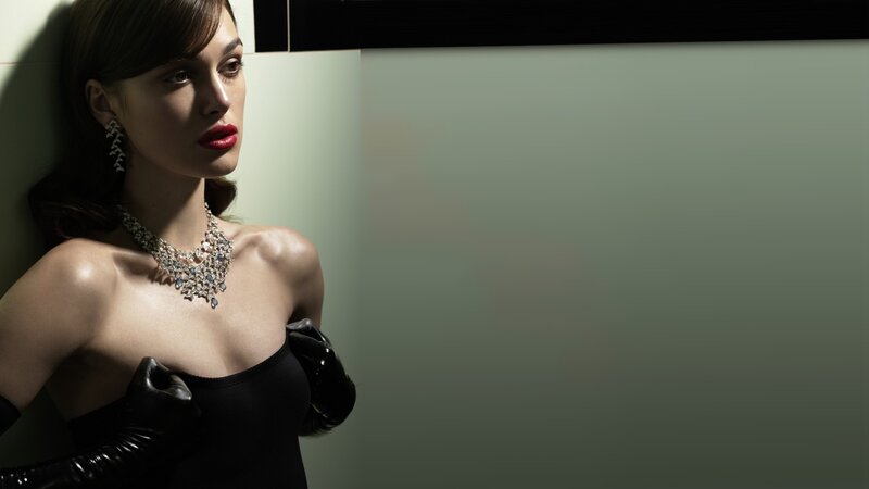 woman in black dress with jewelry