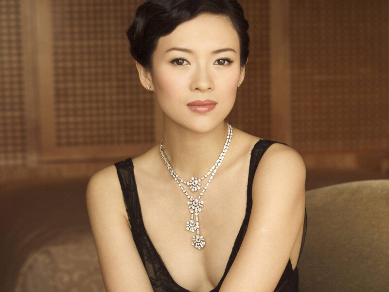woman in black dress with necklace