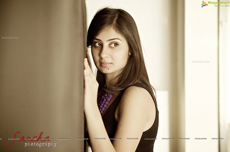 woman in black dress with purple beads