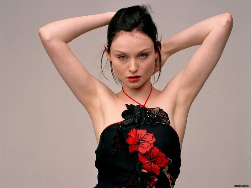 woman in black dress with red flowers