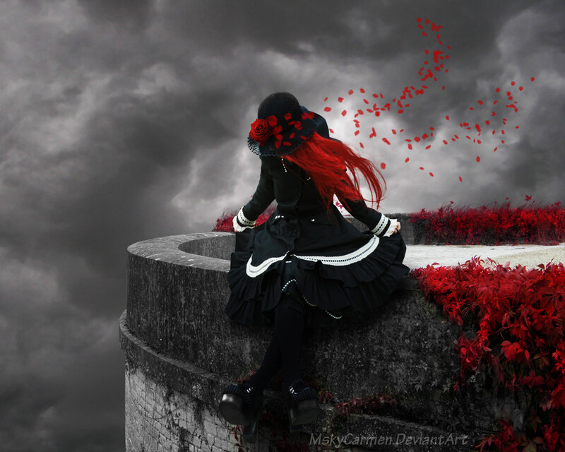 woman in black dress with red hair