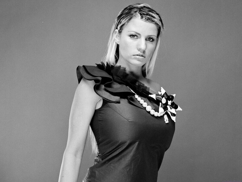woman in black dress with ruffles
