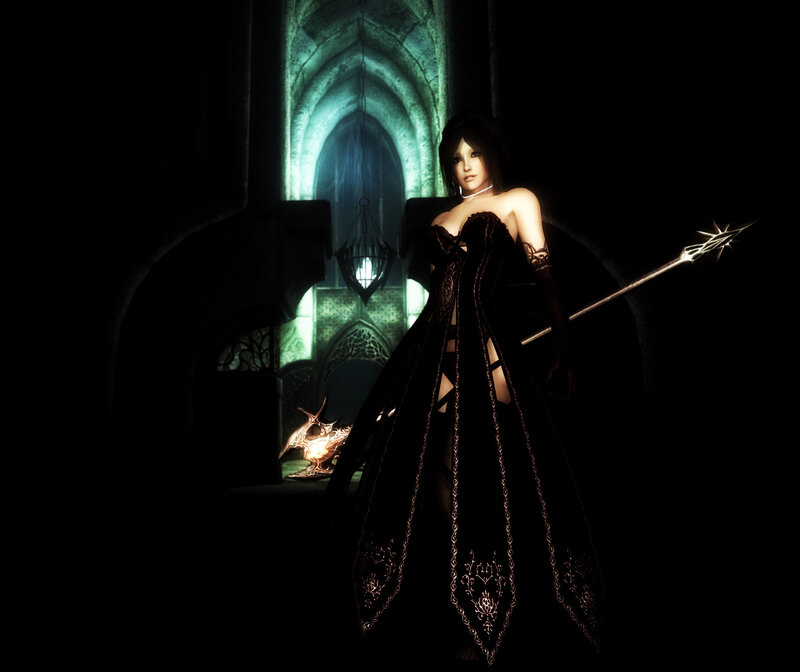 woman in black dress with staff