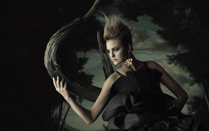woman in black dress with tree