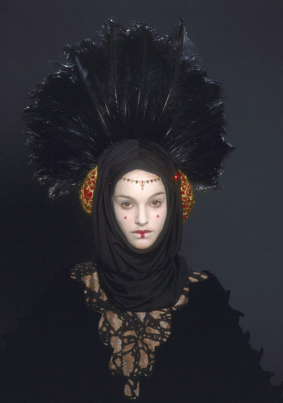woman in black feather headdress