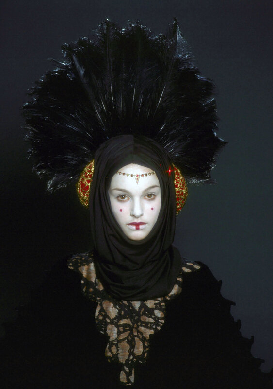 woman in black feather headdress