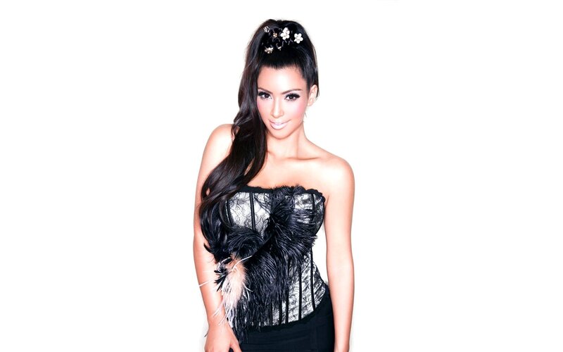 woman in black feathered corset