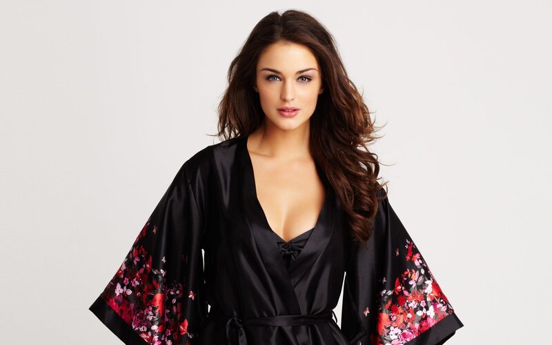 woman in black floral robe