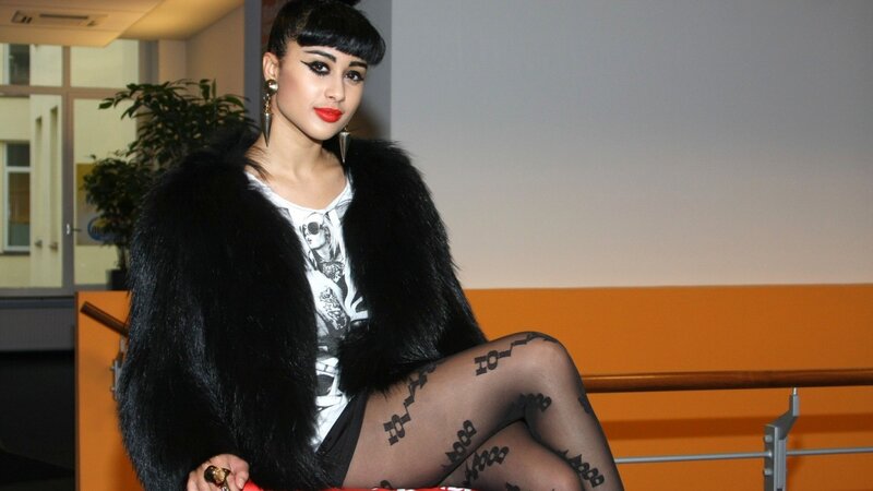 woman in black fur coat