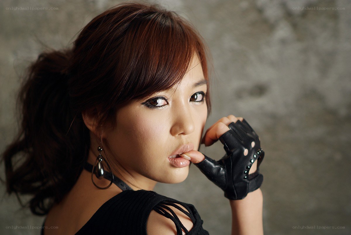 woman in black glove posing