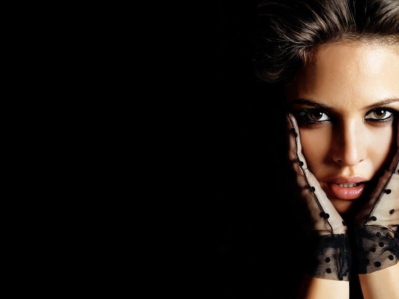 woman in black gloves