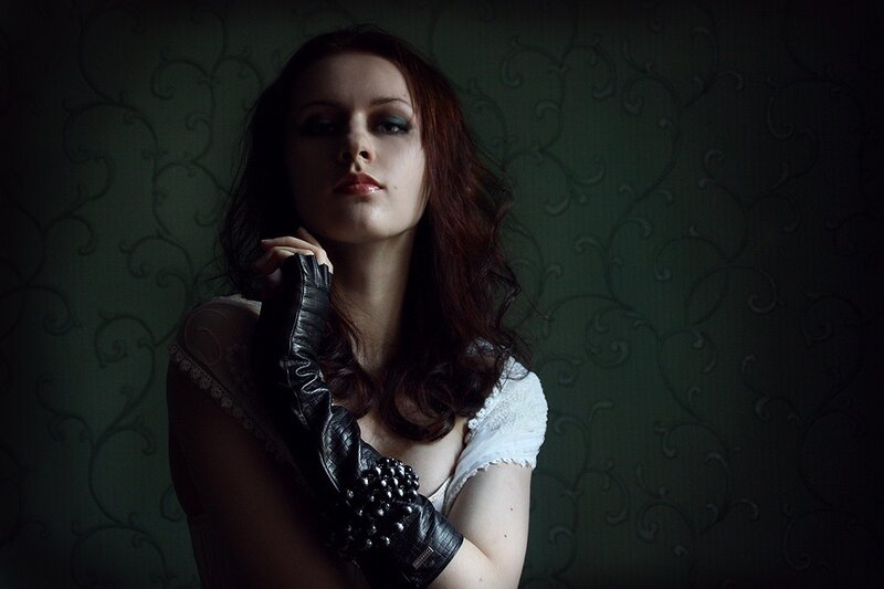 woman in black gloves