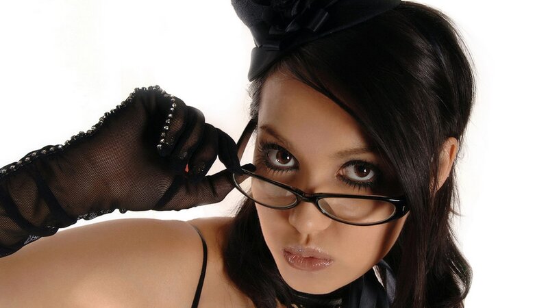 woman in black gloves and glasses