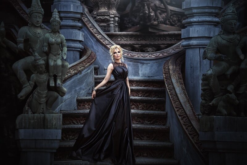 Woman in Black Gown — Dramatic, Photograph, Statues