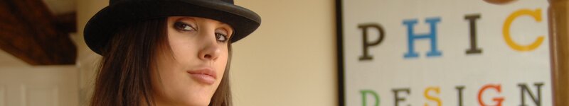 woman in black hat