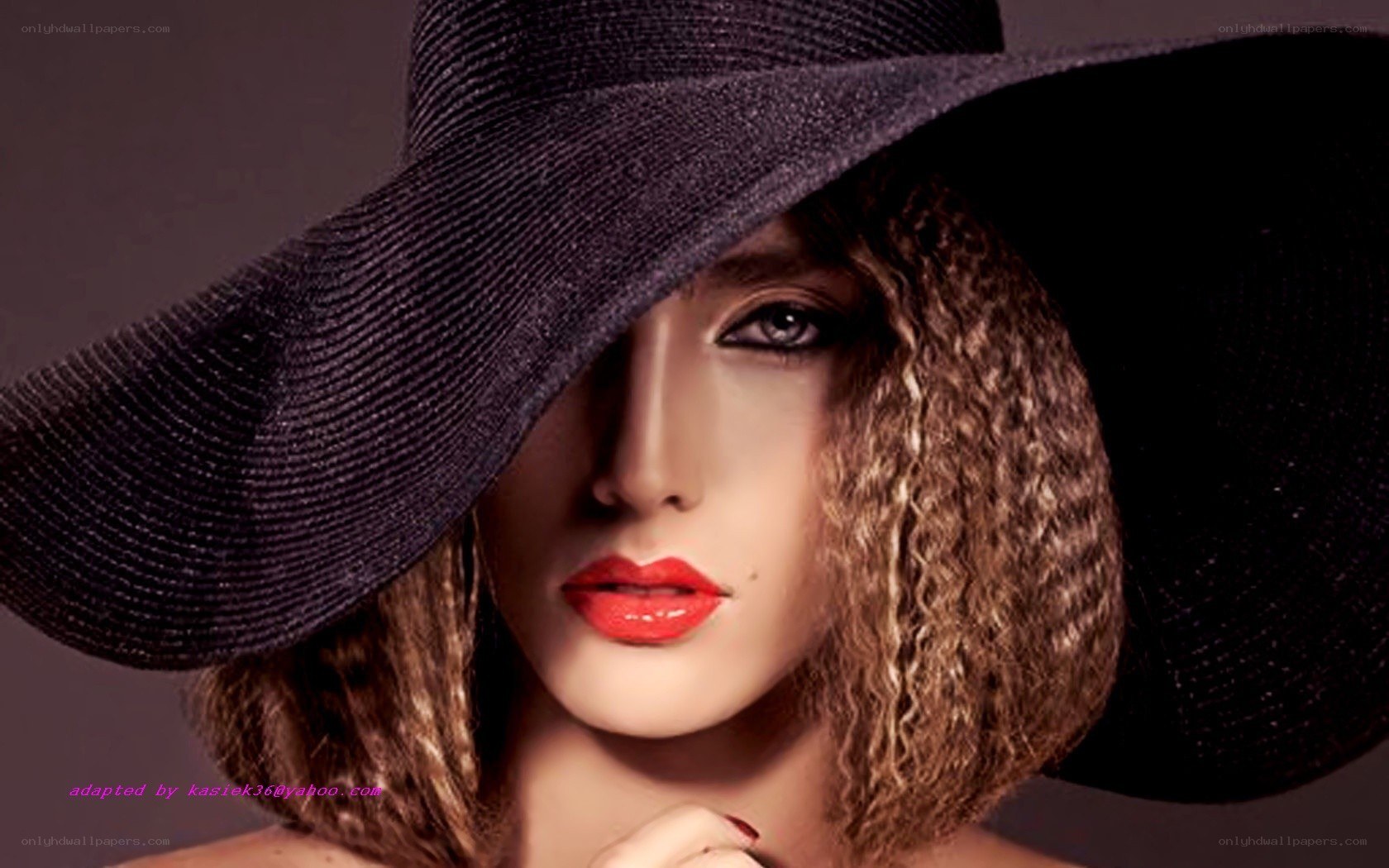 woman in black hat