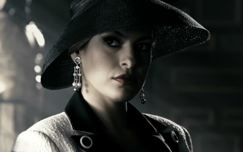 woman in black hat and coat