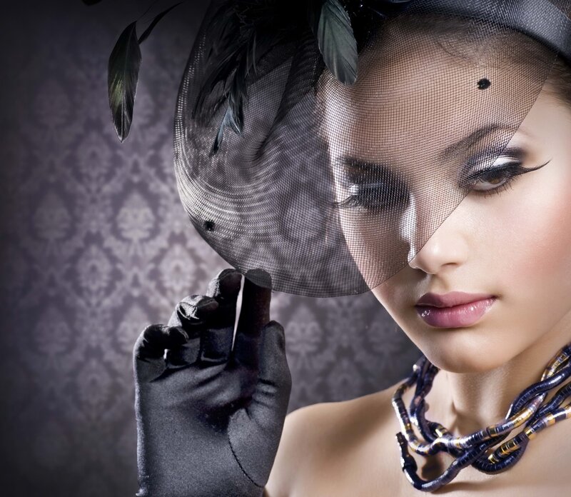 woman in black hat and gloves